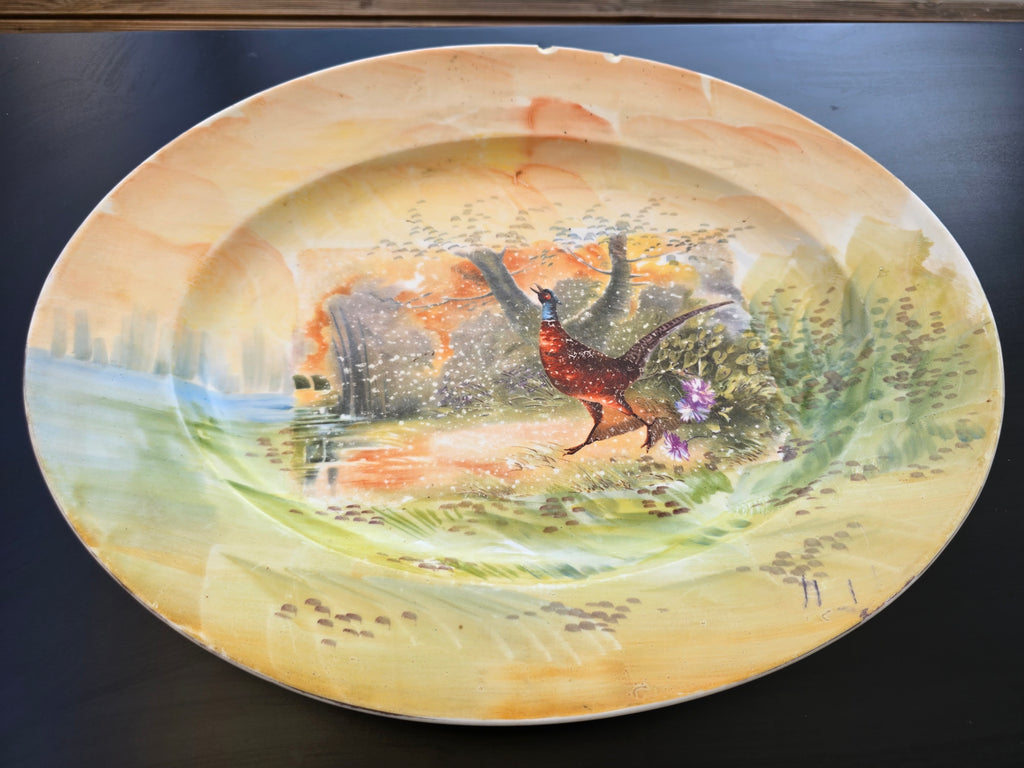 Grand plat creux en porcelaine