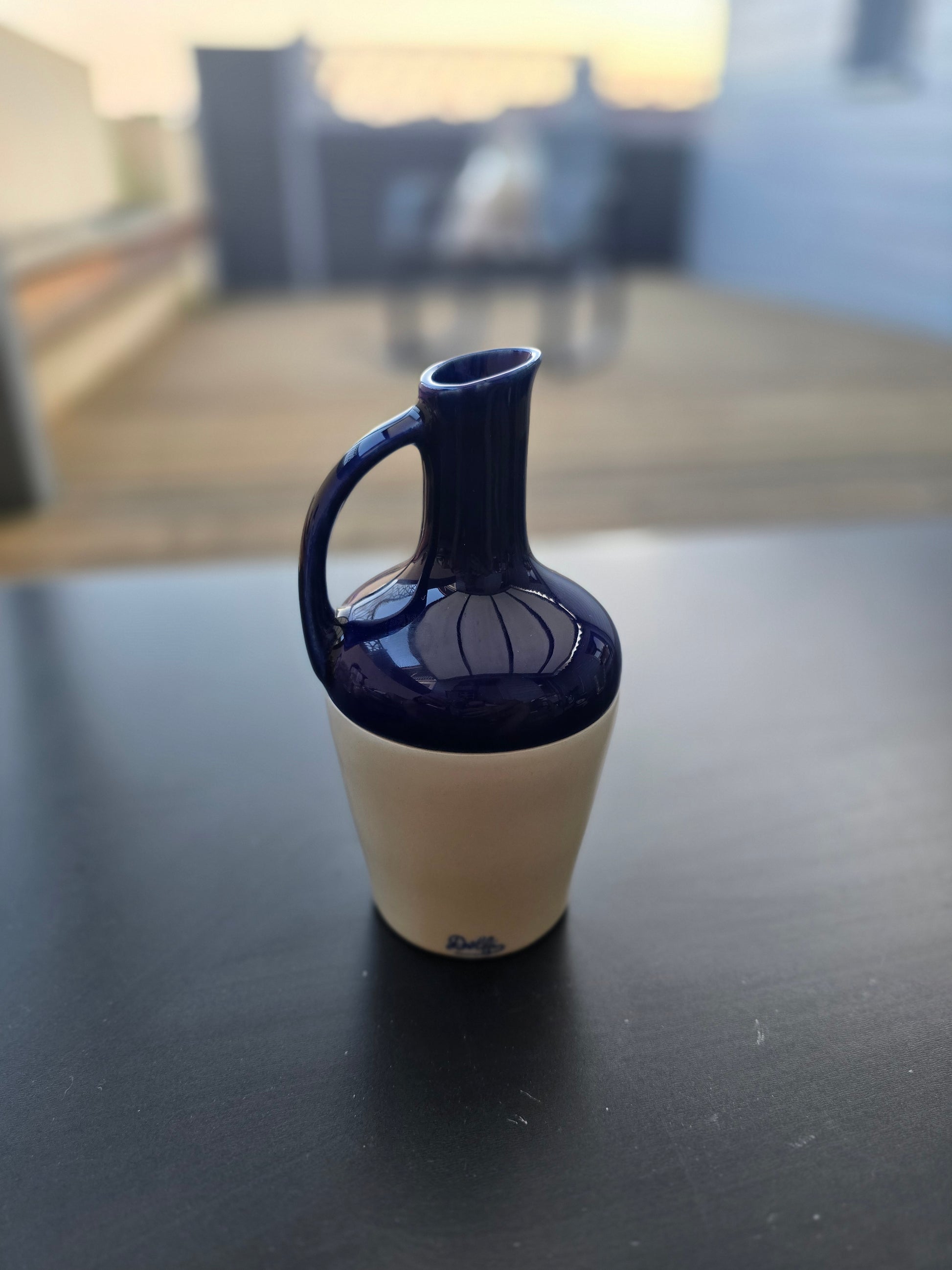 Bouteille en céramique signé Dolfi